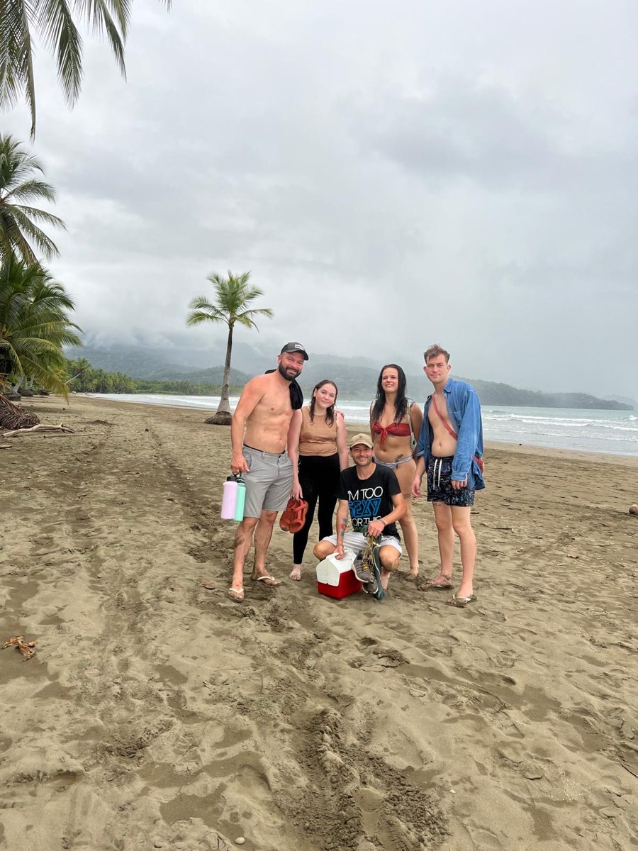 A family enjoying the beach together