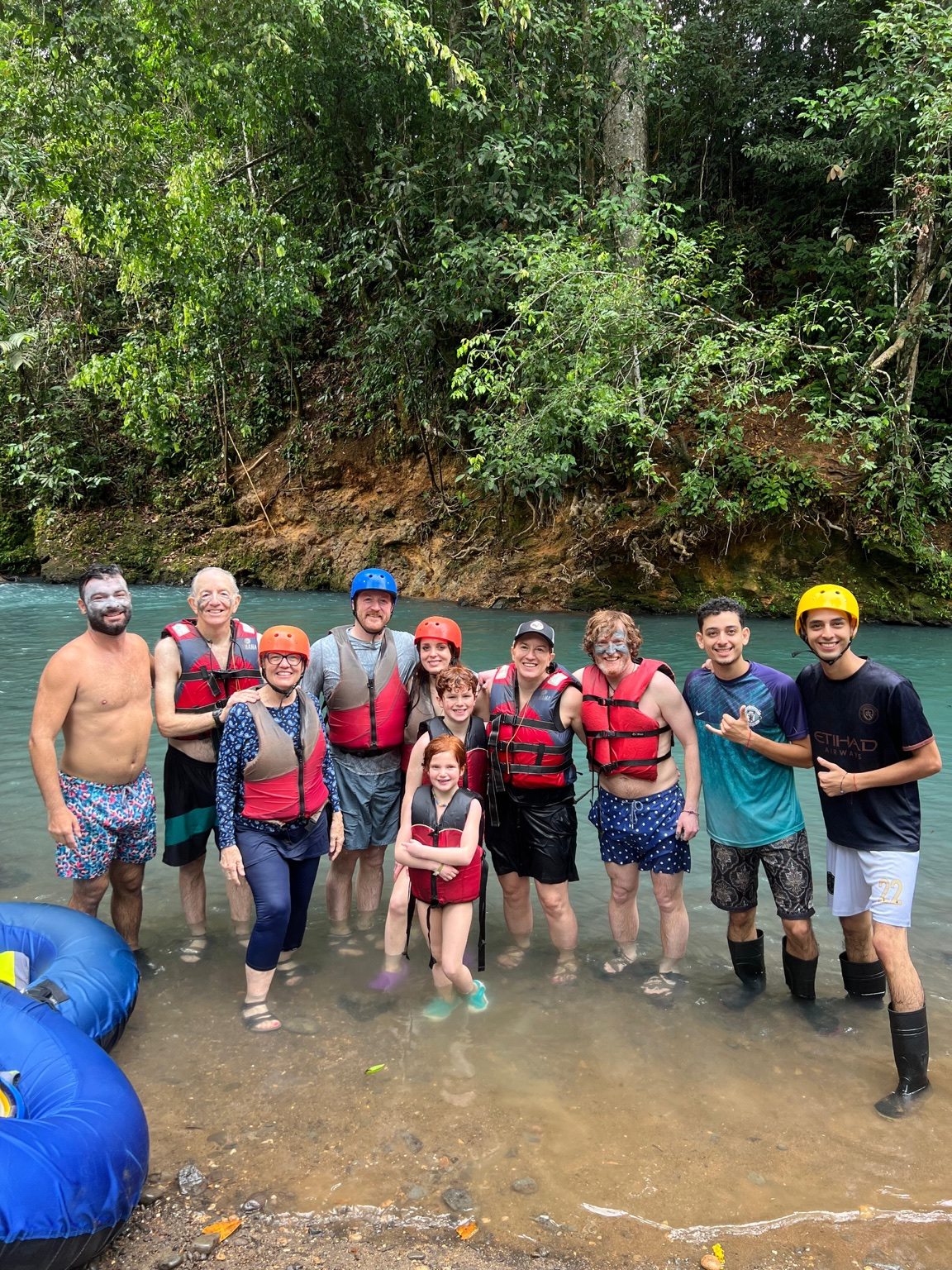 Family and friends together at the river